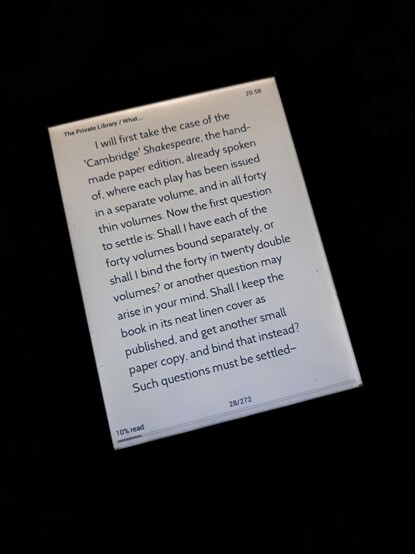 An ereader with light showing an ebook page.