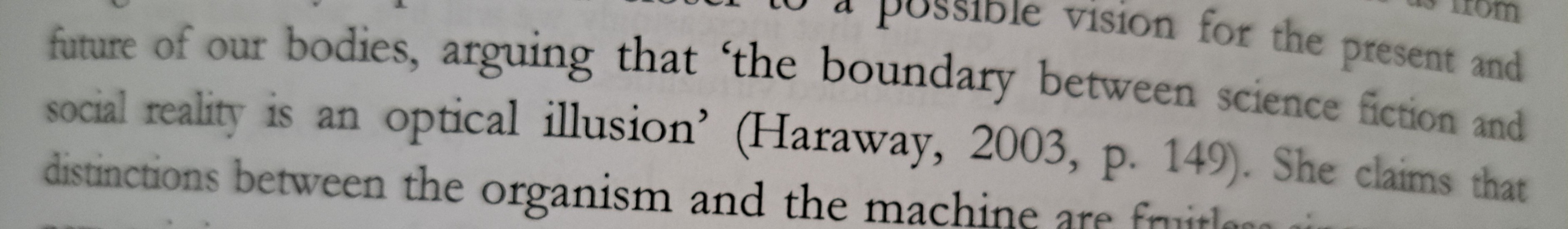 A picture of a book page with a quote from "Haraway, 2003, p. 149" stating that "the boundary between science fiction and social reality is an optical illusion".