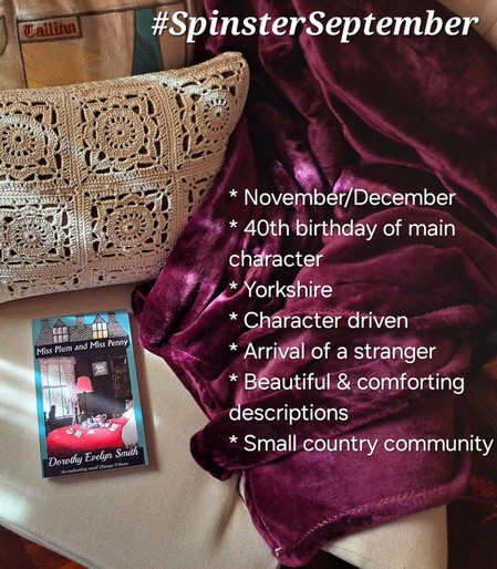The book on an armchair with some pillows and a purple blanket