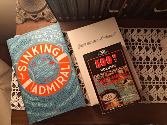 The books over a table next to an old lamp