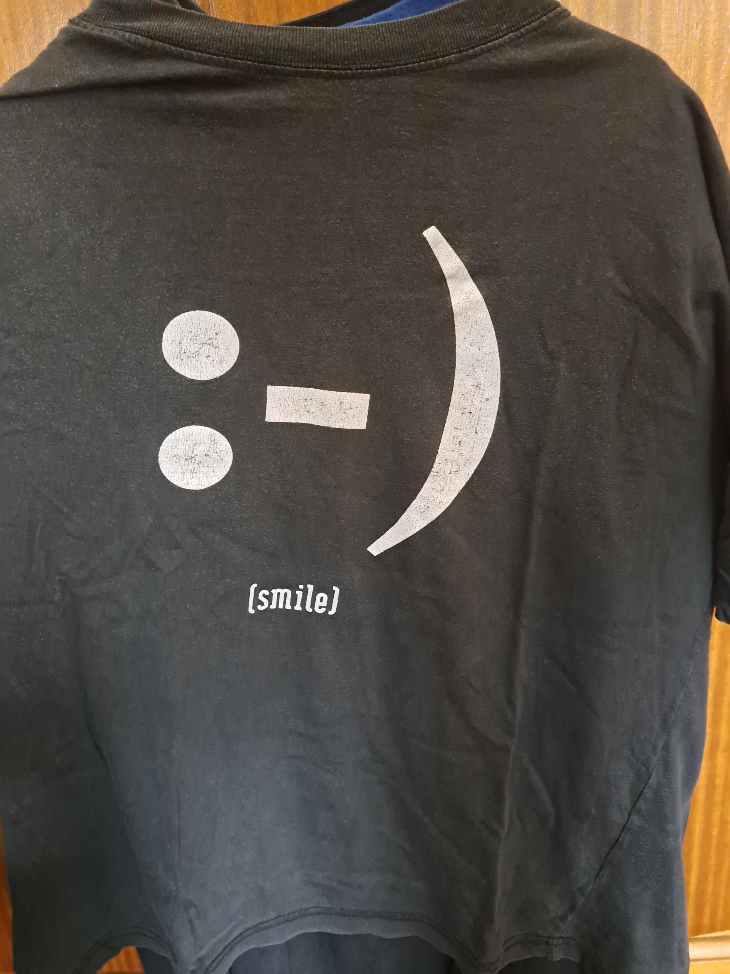 With a disturbing amount of proposals and proponents of banning social media from children, I can't help but think how about my childhood was deeply connected with the (then-existing) social media, how it helped me and made me who I am. This :-) (smile) t-shirt came from a cyber.net (Portuguese magazine about the internet) subscription, and I proudly often weared it. I wasn't 16 years old yet back then, no.