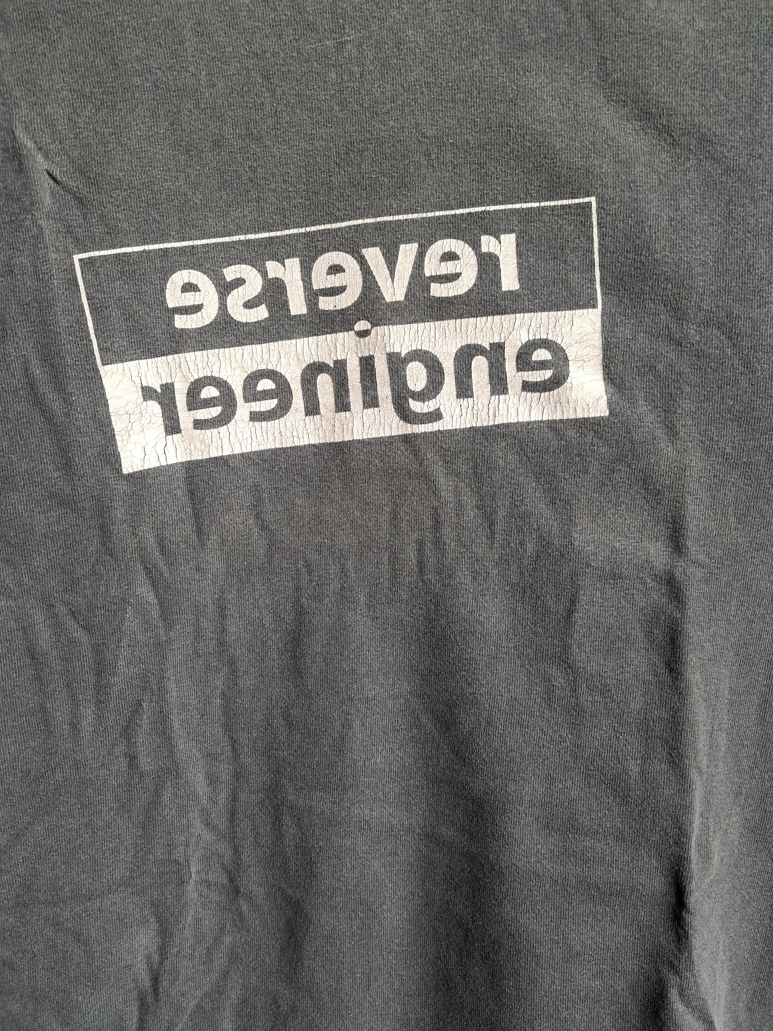 A t-shirt saying "reverse engineer", the letters themselves printed in reverse