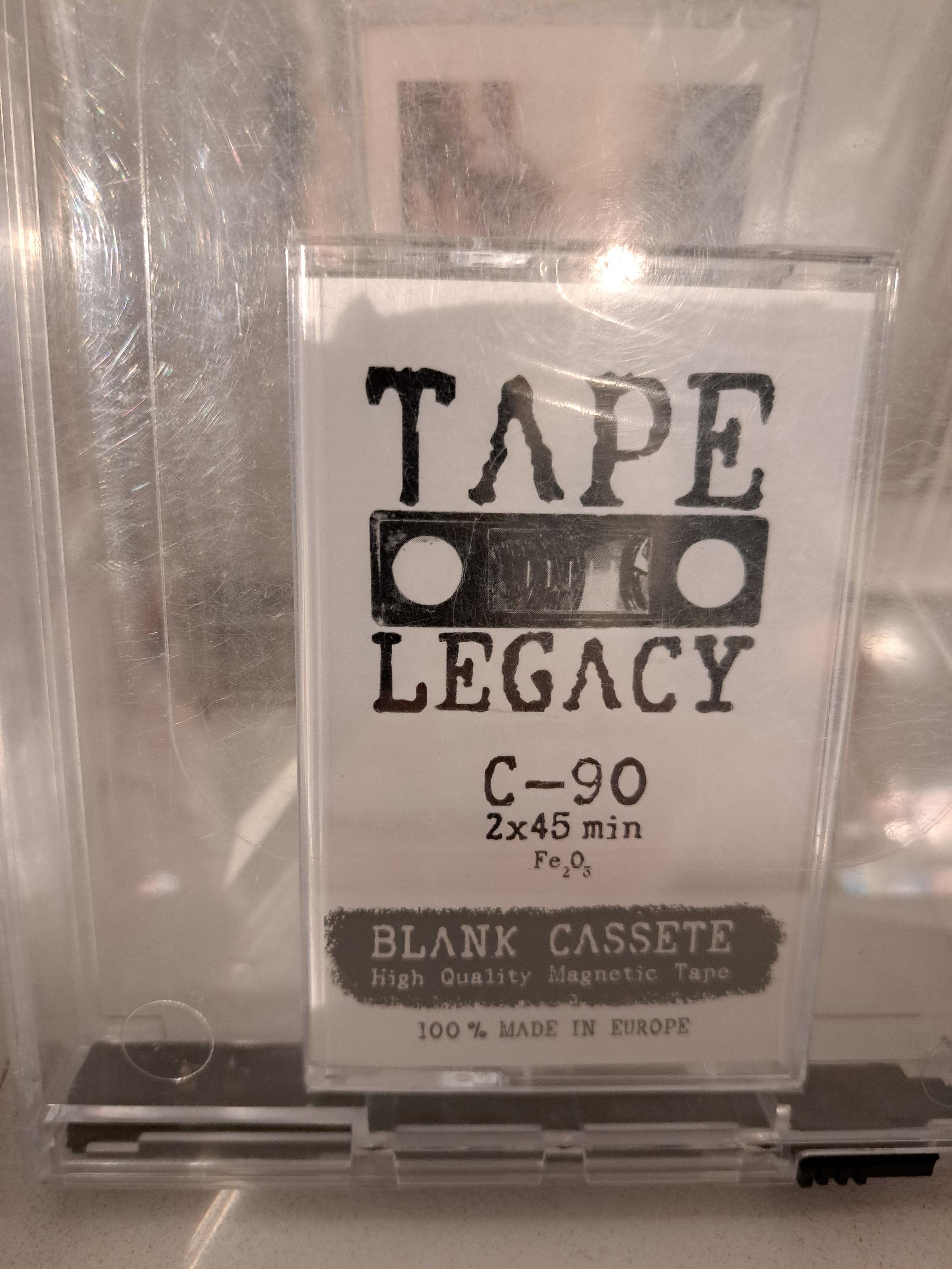A blank cassette tape, proudly announcing being so: